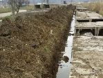 Новости » Коммуналка: В Керчи тепловики вырыли окопы в жилом районе и забыли про них
