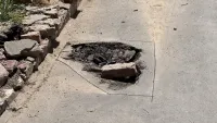 На новом тротуаре по ул.Крупской появилась дыра