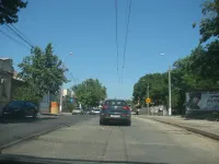 Новости » Общество: В Керчи по улице Свердлова первый слой асфальта уложили до середины куоровского кольца