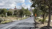 На улице Войно-Ясенецкого начали укладывать асфальт