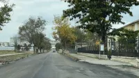 Новости » Общество: На Войно-Ясенецкого уложили второй слой асфальта