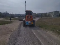 Новости » Общество: В Керчи продолжают ремонтировать грунтовые дороги